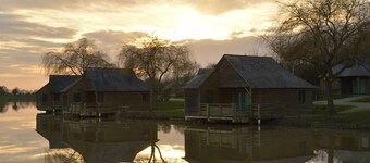 Lakeside Chalet with Private Fishing Pier, Terrace & Family Amenities - Sleeps 7