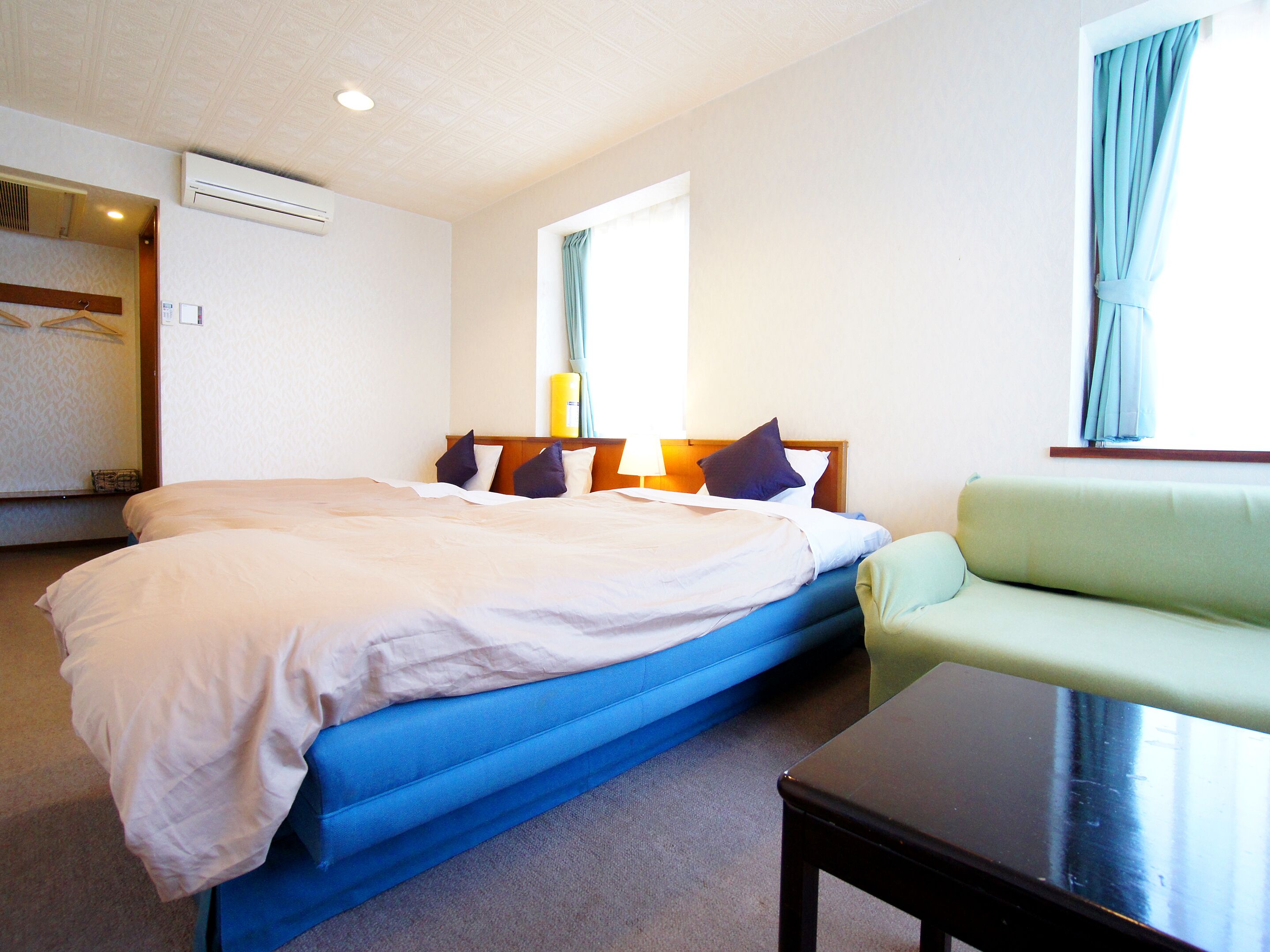 Desk, laptop workspace, free WiFi, bed sheets