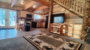 TV connectée, cheminée, lecteur de DVD, vidéothèque