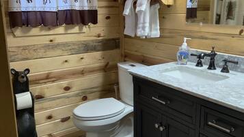 Combined shower/bathtub, hair dryer, towels, soap