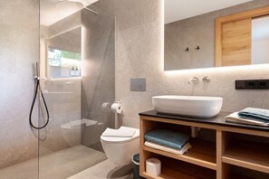 Bathtub, hair dryer, towels