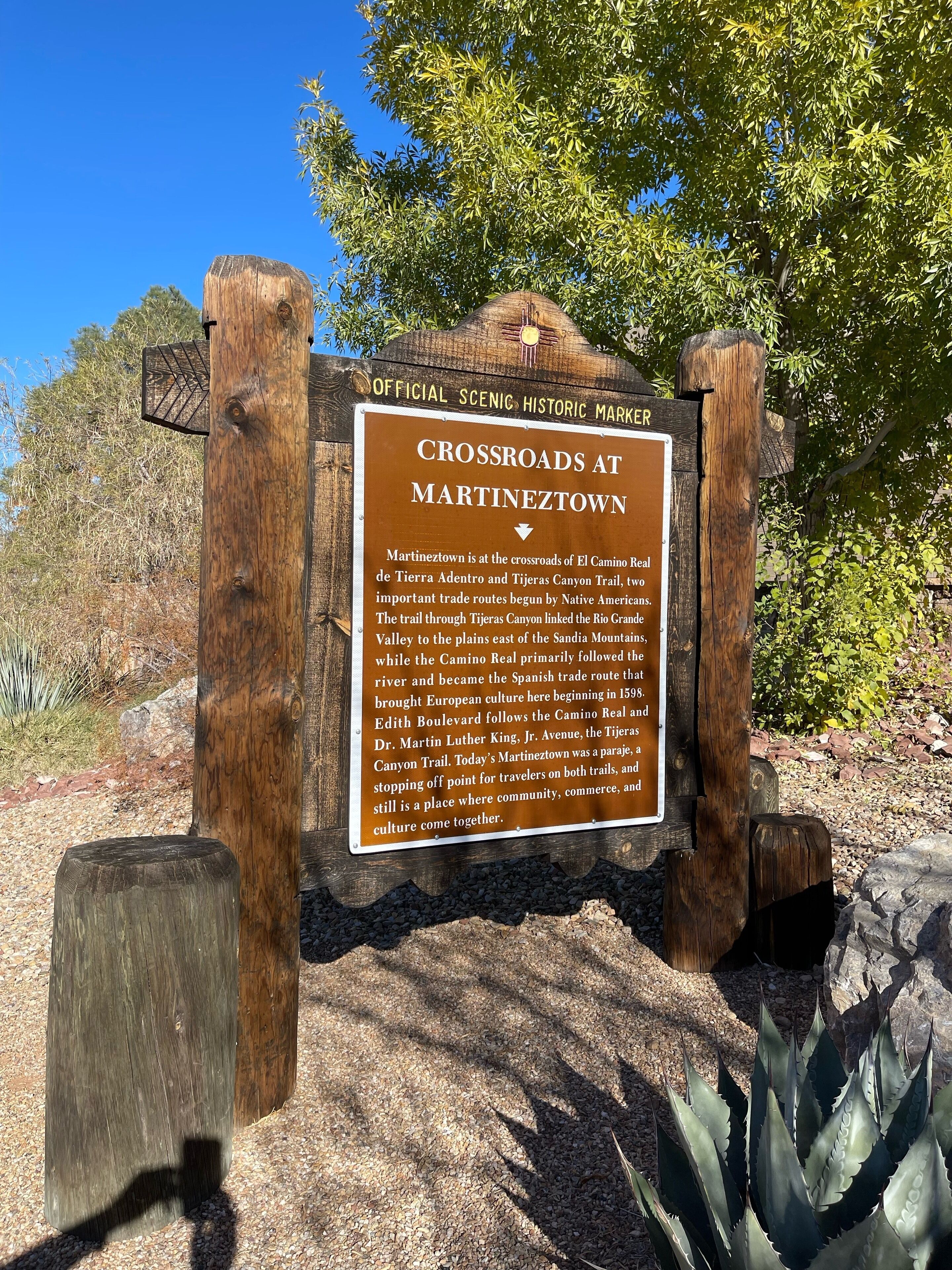 A historic marker sign at Crossroads at Martineztown.
