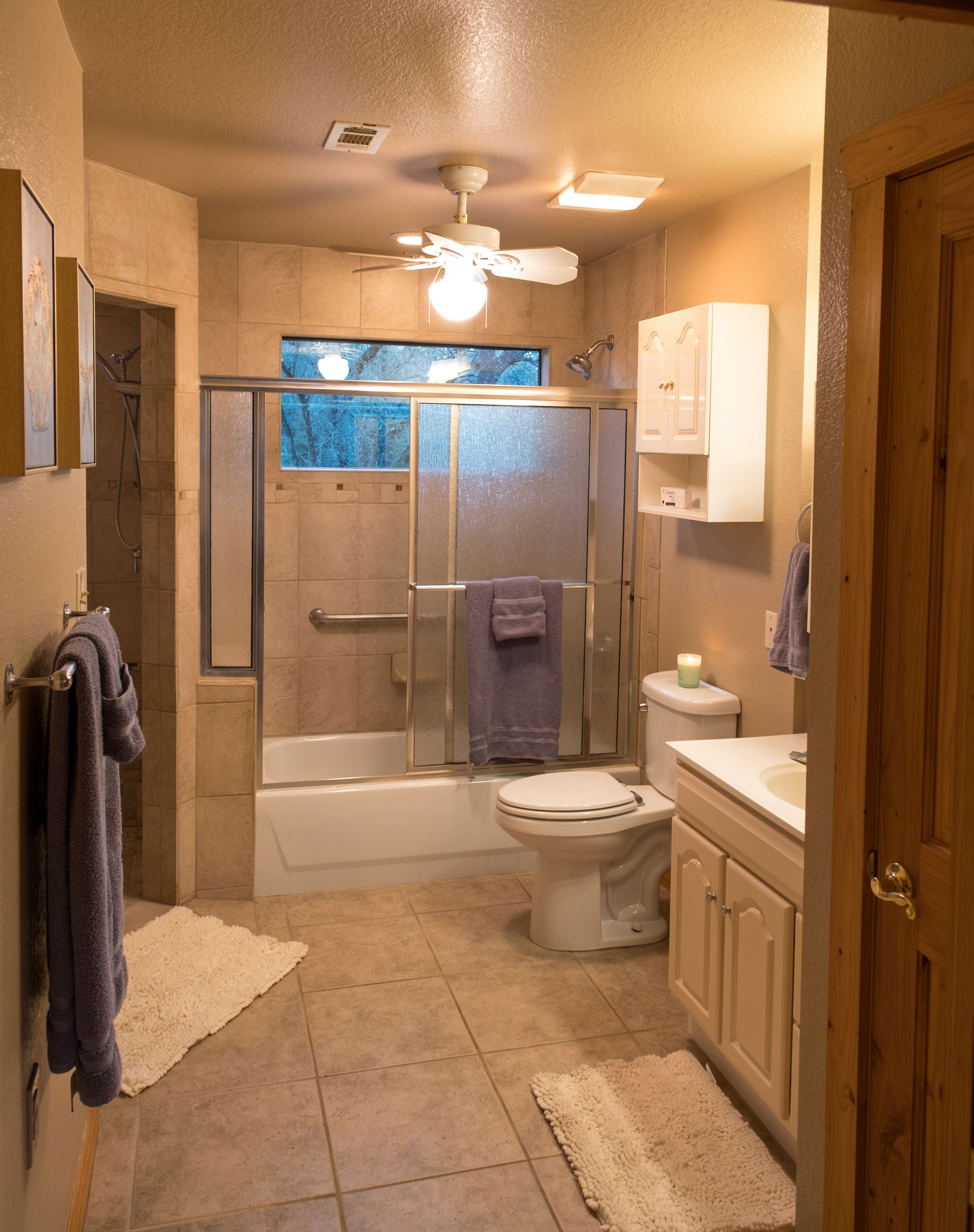 Combined shower/bathtub, hair dryer, towels, soap