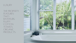 Combined shower/bathtub, hair dryer, towels, soap