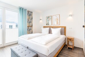 2 bedrooms, in-room safe, iron/ironing board, travel cot