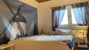 1 dormitori i roba de llit