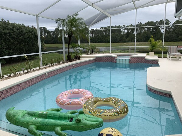 Outdoor pool - Private house with pool and jacuzzi, lake views, backyard with lake view, patio! (Kissimmee)