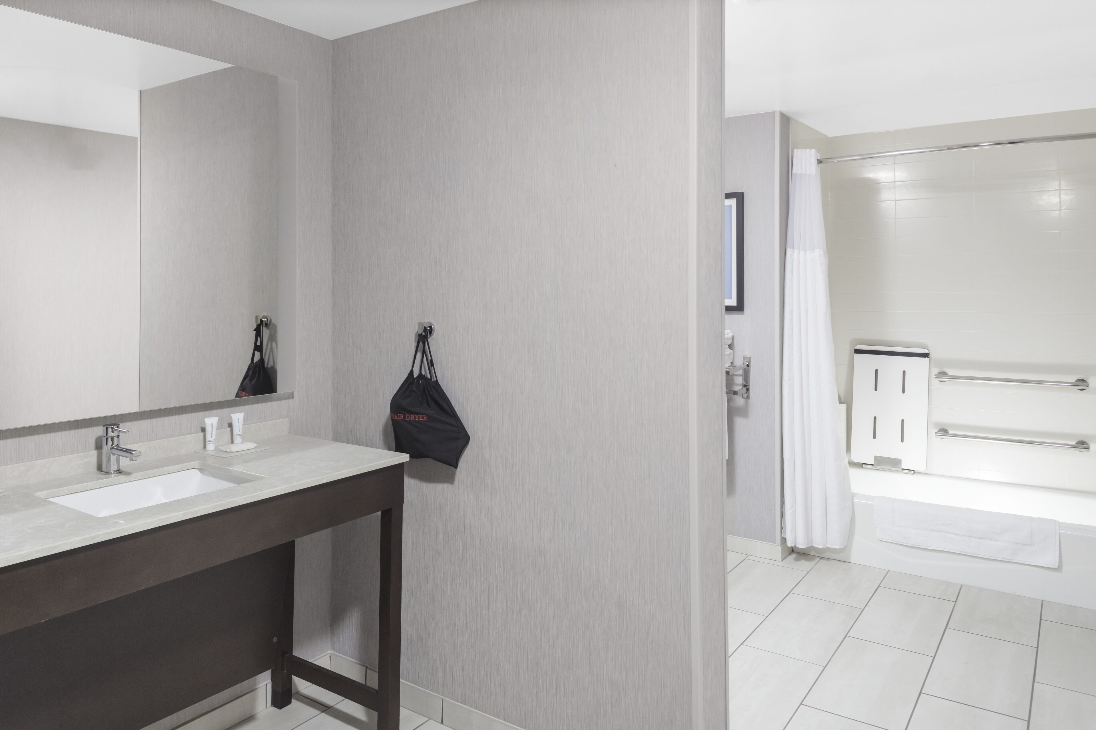 hair dryer, towels, soap, shampoo