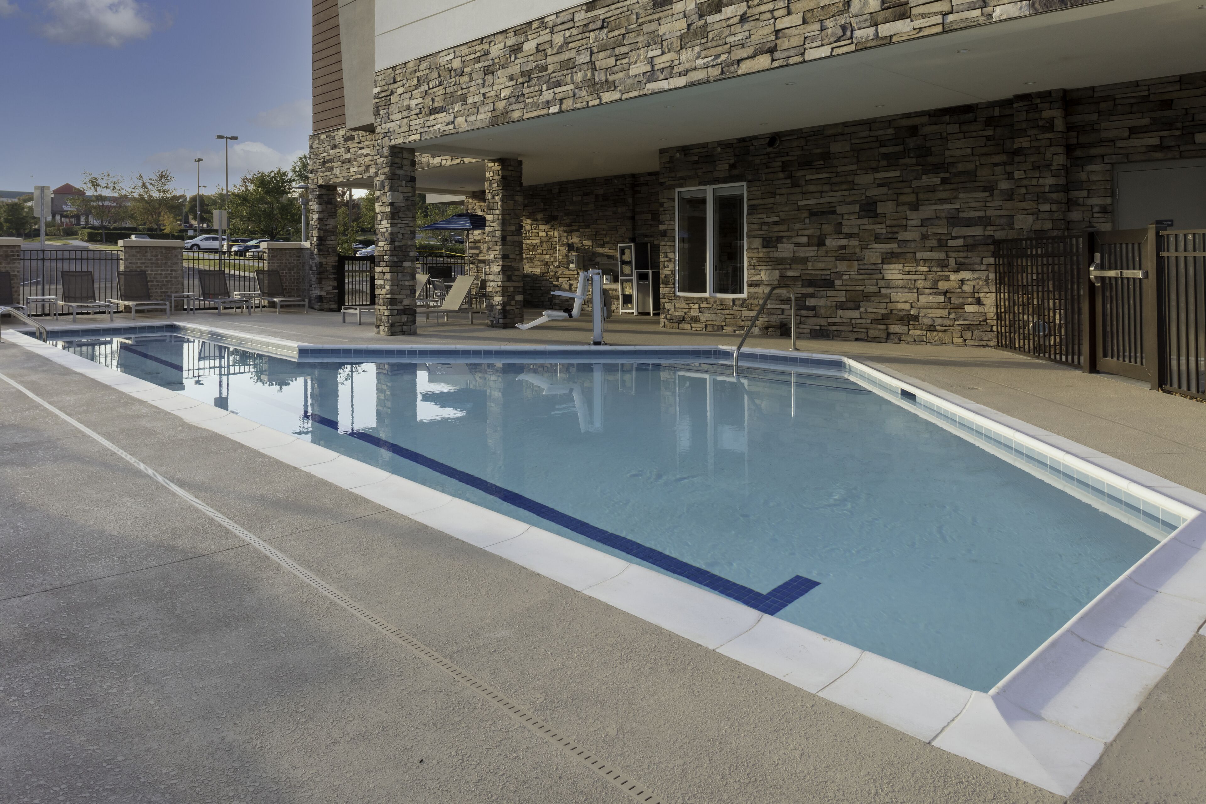 Seasonal outdoor pool, open 8:00 AM to 8:00 PM, pool umbrellas