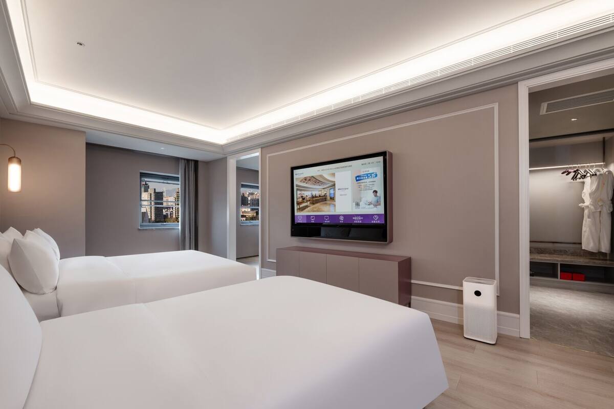 FamilieTwin kamer, Meerdere bedden (Classic) | Hypoallergeen beddengoed, donsdekens, een gratis minibar, een bureau