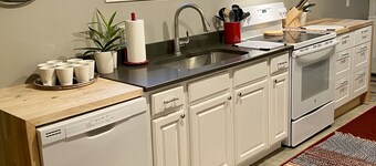 Old World Charm Basement Level Flat in upscale Cherry Creek
