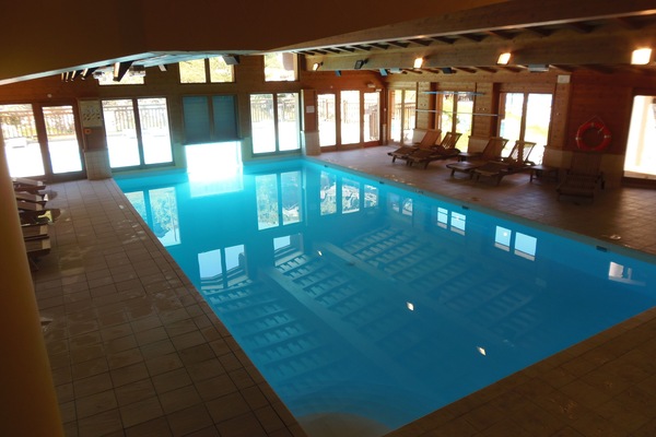 Indoor/outdoor pool in the building Prince des Cimes, which we have access to.