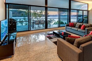 Apartment | Living area | 40-inch Smart TV with cable channels, TV, DVD player - Waves 6 Breathtaking Ocean Views (Whitsundays)