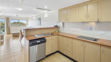 Apartment | Private kitchen | Full-sized fridge, microwave, oven, stovetop