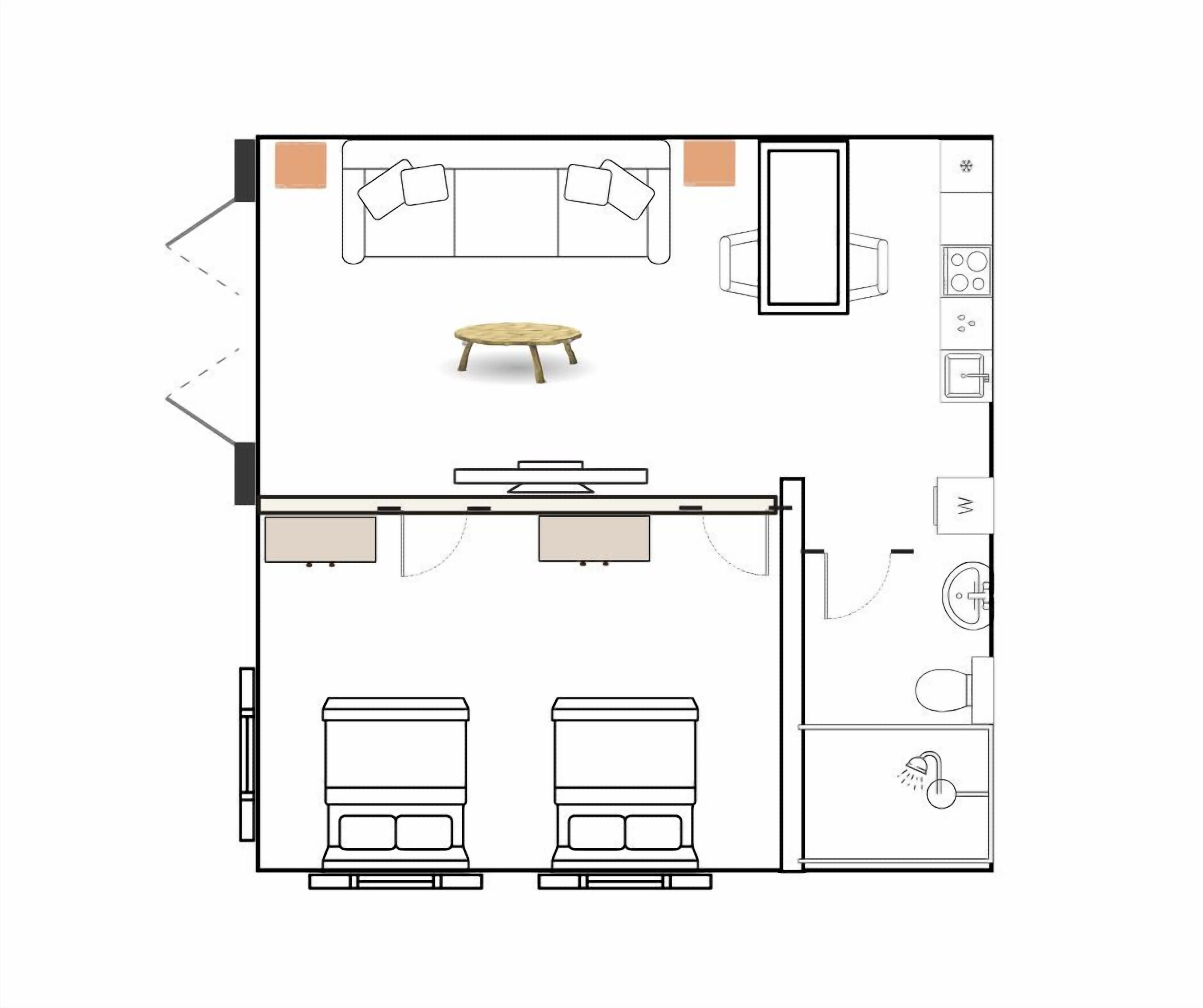 En planritning över ett hotellrum med en säng, ett skrivbord, en stol, ett litet bord och en soffa.
