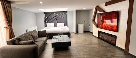 Estudio superior | 1 dormitorio, ropa de cama hipoalergénica, tabla de planchar con plancha