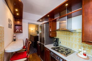 Departamento (Two Bedroom Apartment) | Cocina privada | Refrigerador, microondas, parrilla de estufa y lavavajillas 