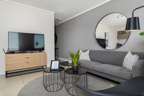 Grand-Apartment | Wohnbereich | Flachbildfernseher