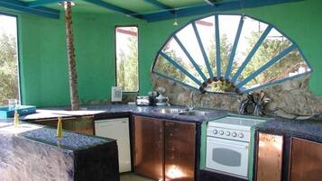 Coffee/tea maker, fridge, microwave, oven