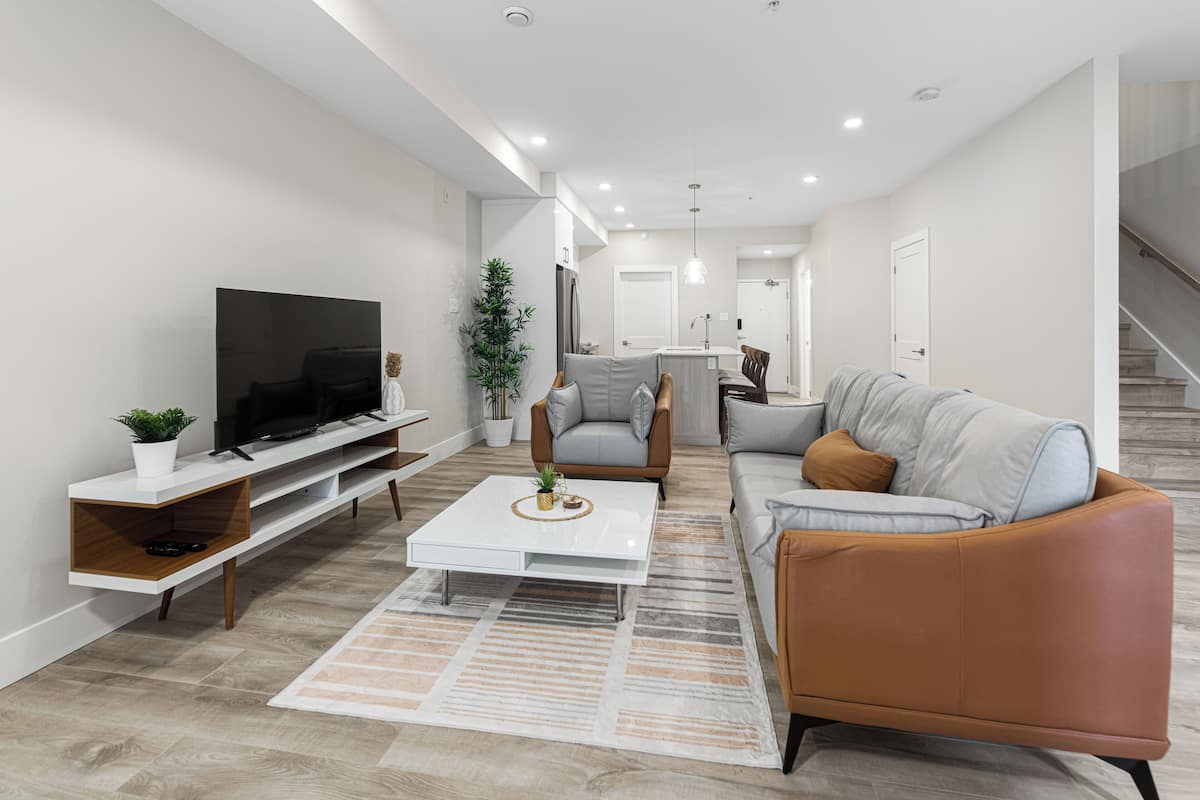 city apartment | living area | 50-inch flat-screen tv with cable channels, tv