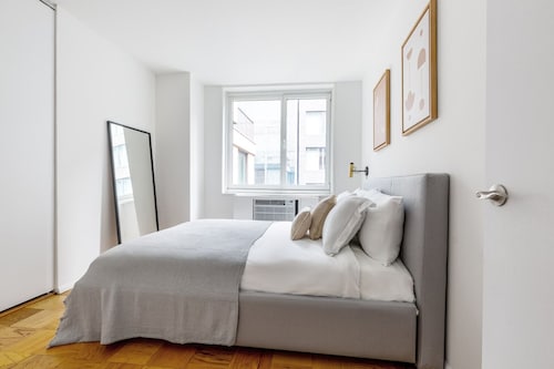 Stylish  Midtown 1BR w/ Gym + Doorman, near Central Park, by Blueground