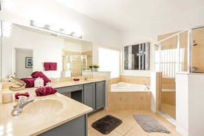 Combined shower/bathtub, hair dryer, towels, soap