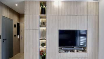 Comfort Apartment, Non Smoking, City View | Living area | 55-inch LED TV with satellite channels, TV, smart speakers