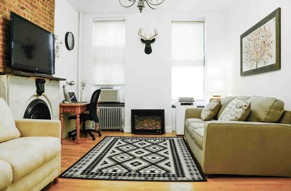 Living area - Cozy Entire Apartment near Time Square. (New York)