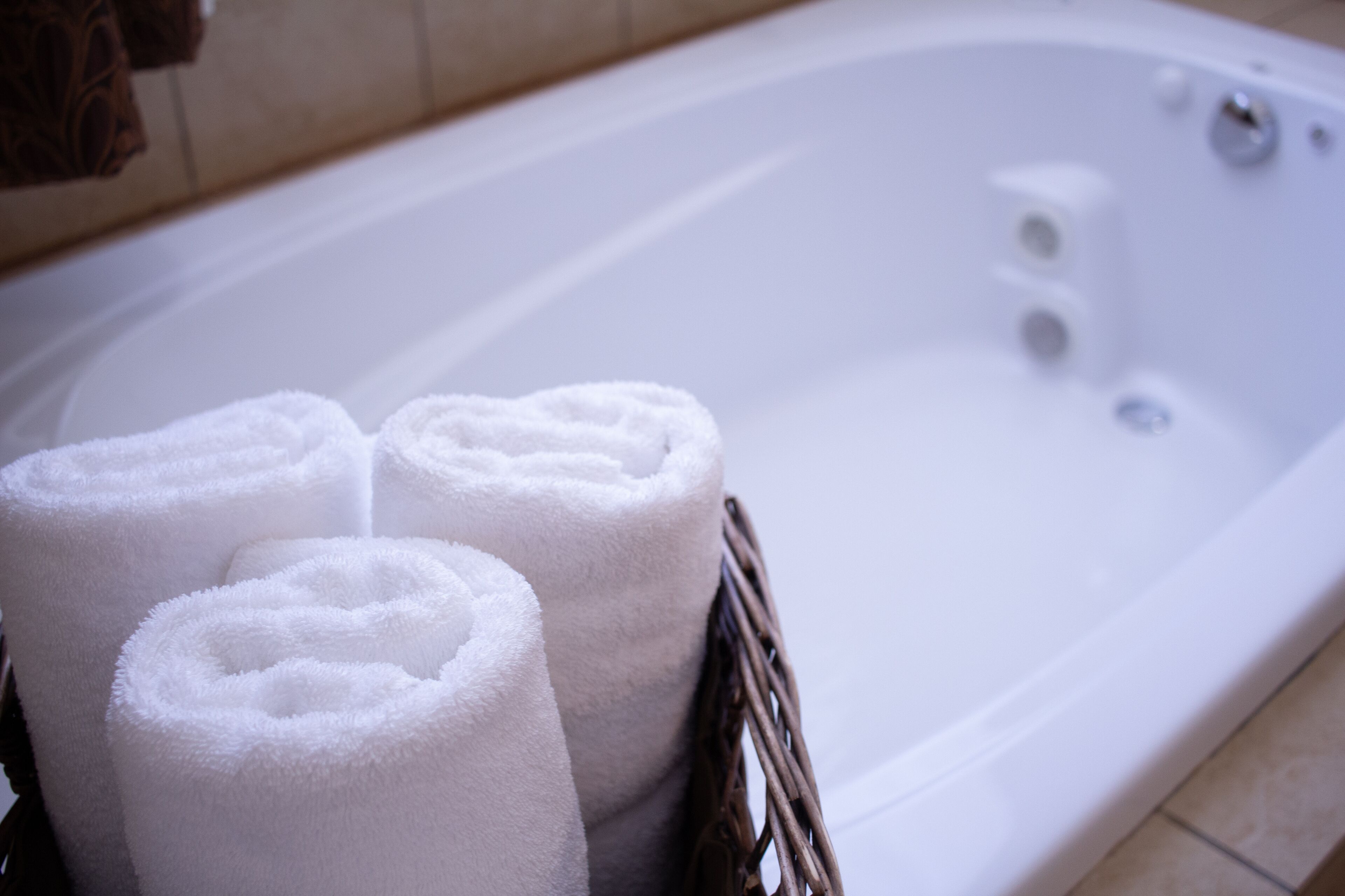 Suite, 1 King Bed, Jetted Tub | Bathroom | Shower, free toiletries