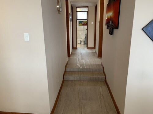 A modernized home in the midst of a stable, family oriented neighborhood. 