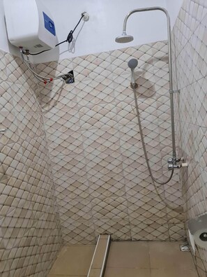Shower, towels, soap, toilet paper