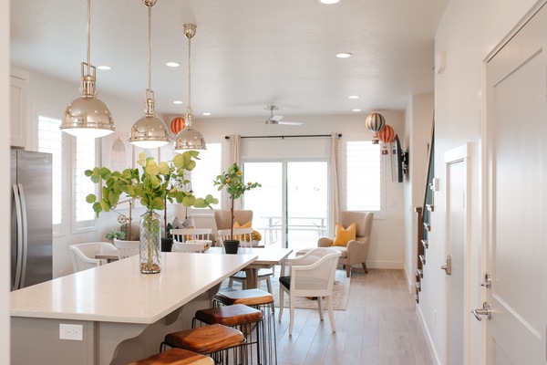 Bright kitchen with stainless appliances and a large island — ideal for cooking and gathering.