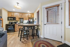 Fridge, microwave, stovetop, dishwasher - South Branch Condo 13-1 - Pet Friendly Ski in Ski out condo at Saddleback (Rangeley)