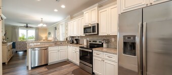 Private paradise! Gorgeous 4/3 Half duplex w/ private pool & dockage!