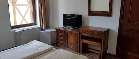 Habitación, 1 habitación, vista a la ciudad | 1 habitación y ropa de cama