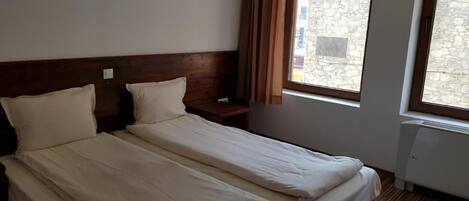 Kamer, 1 slaapkamer, uitzicht op de stad | 1 slaapkamer, beddengoed