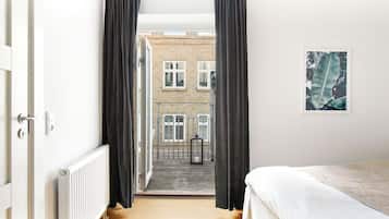 Apartemen, 3 kamar tidur, balkon, pemandangan kota | 3 kamar tidur, setrika/meja setrika, dan Wi-Fi