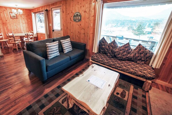 TV, fireplace, DVD player, video library - Mountain Decor in this Two Bedroom Cabin with a beautiful mountain view from deck. Dog friendly (Estes Park)