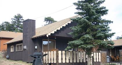 Mountain Decor in this Two Bedroom Cabin with a beautiful mountain view from deck. Dog friendly