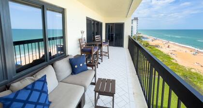 Updated direct oceanfront corner condo with private balcony, heated pool and garage