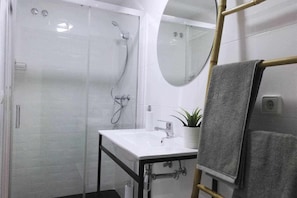 Hair dryer, towels, soap, toilet paper