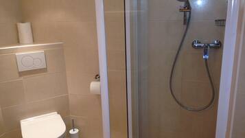 Combined shower/tub, hair dryer, towels, soap