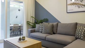 Exclusive Apartment, 4 Bedrooms, Non Smoking, Patio | Living area | 40-inch flat-screen TV with digital channels, TV