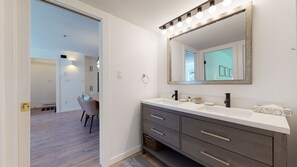 Bathtub, hair dryer, towels