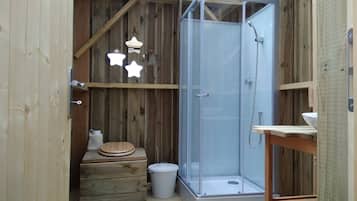 Bathtub, hair dryer, towels, soap