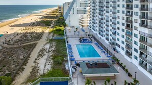 A high-rise hotel with a rooftop pool, beach access, and ocean views. - Plaza 712 - 2Br/Den/2Ba oceanfront w/indoor,outdoor and kiddie pools. (Ocean City)