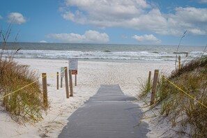 On the beach, sun-loungers, beach towels