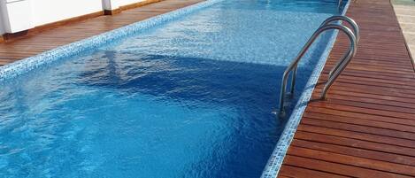 Outdoor pool, sun loungers