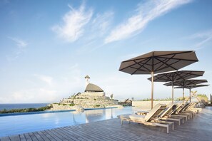 15 outdoor pools, pool umbrellas, pool loungers