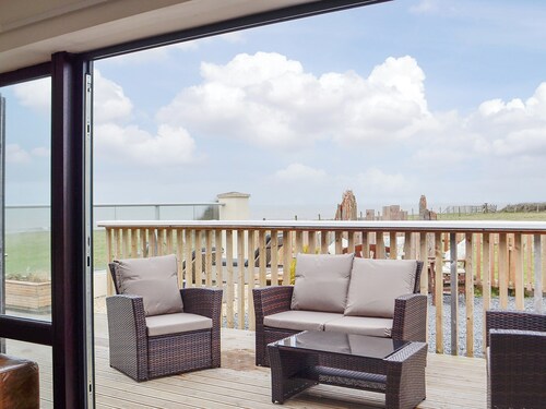 Gorgeous glass fronted property on ground floor level with sea views.